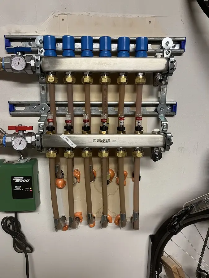 Plumber performing Water Heater Repair at a residential property in Barberton